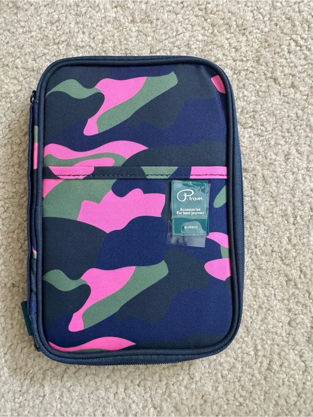 P-Travel pink and blue camo passport holder.